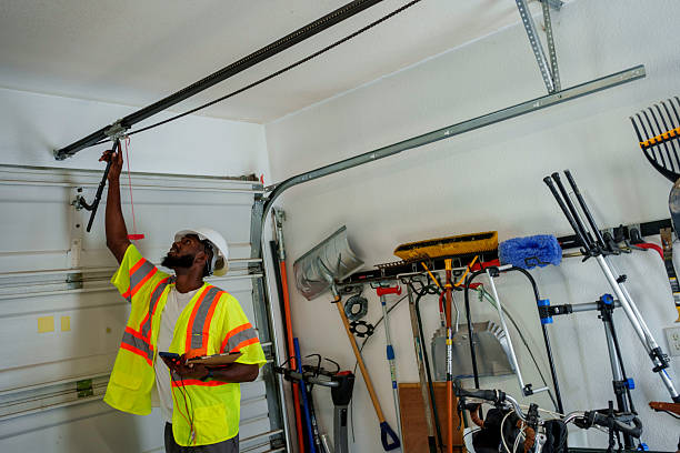 Professional Garage Door Panel Replacement technician working in Madison County County, NE